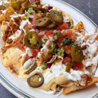 NACHOS! 🧀 . Come on by for dinner! Order from our website for always free delivery!